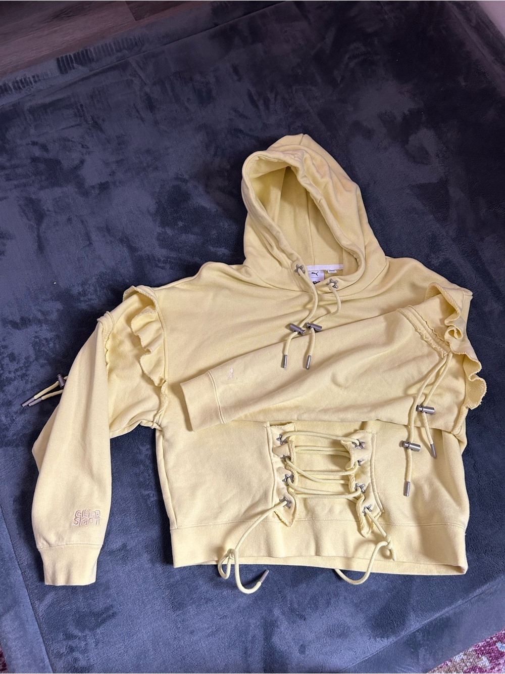 Puma Collina Strada Collab Women's Pale Yellow Lace-Up Hoodie star detail